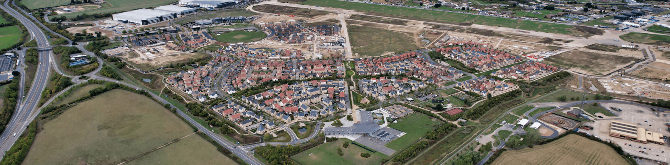 An aerial photograph of the expanding development at Alconbury Weald. © U&C