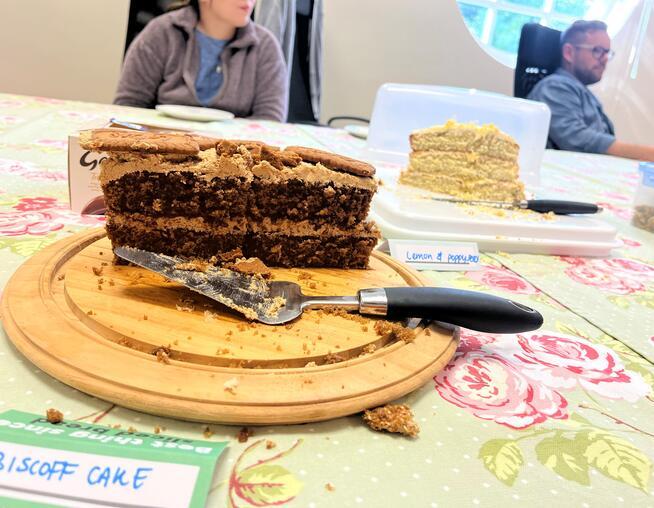 A photograph of a piece of cake on a table